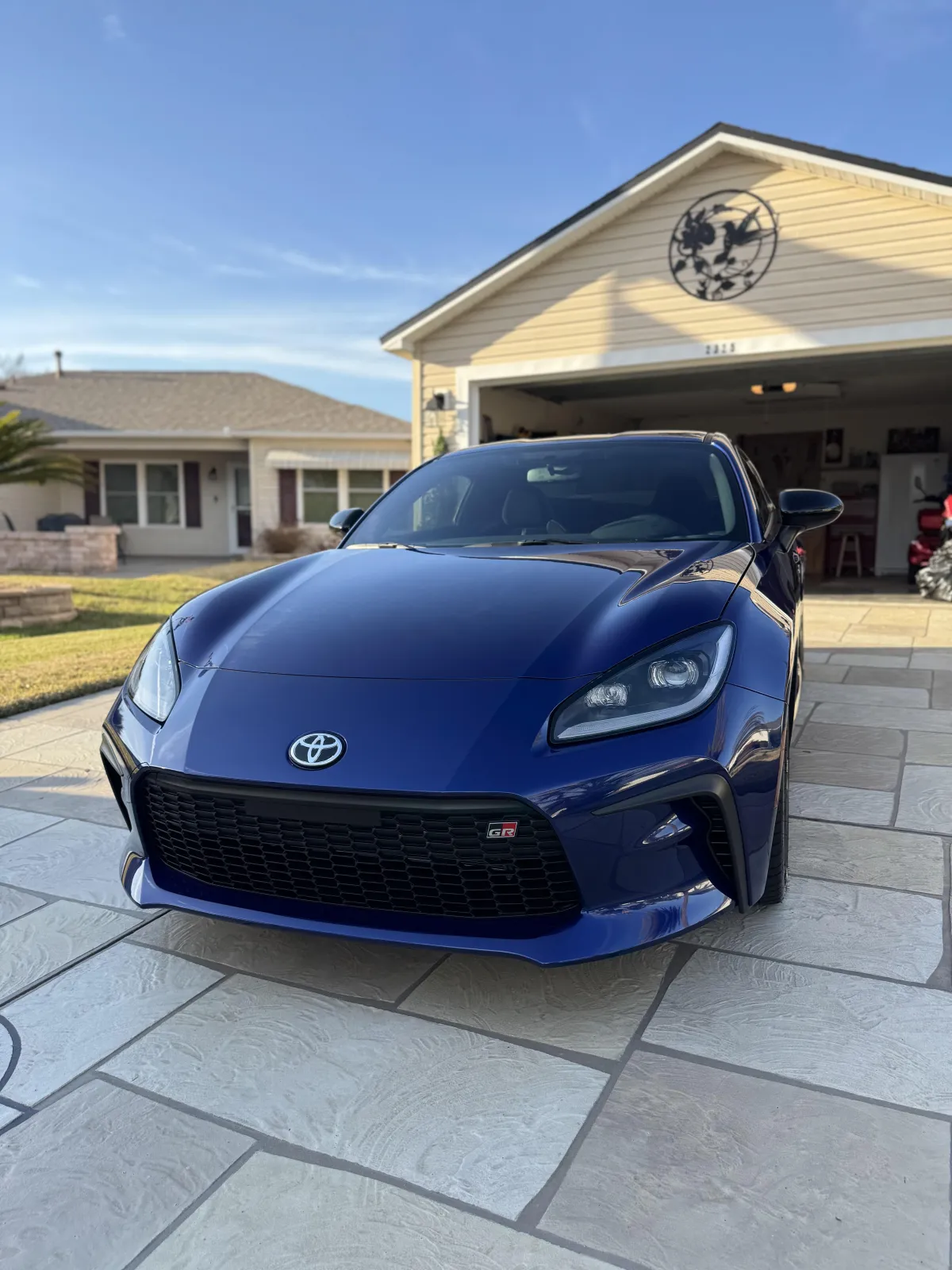 Detailing expert performing multi-step paint correction