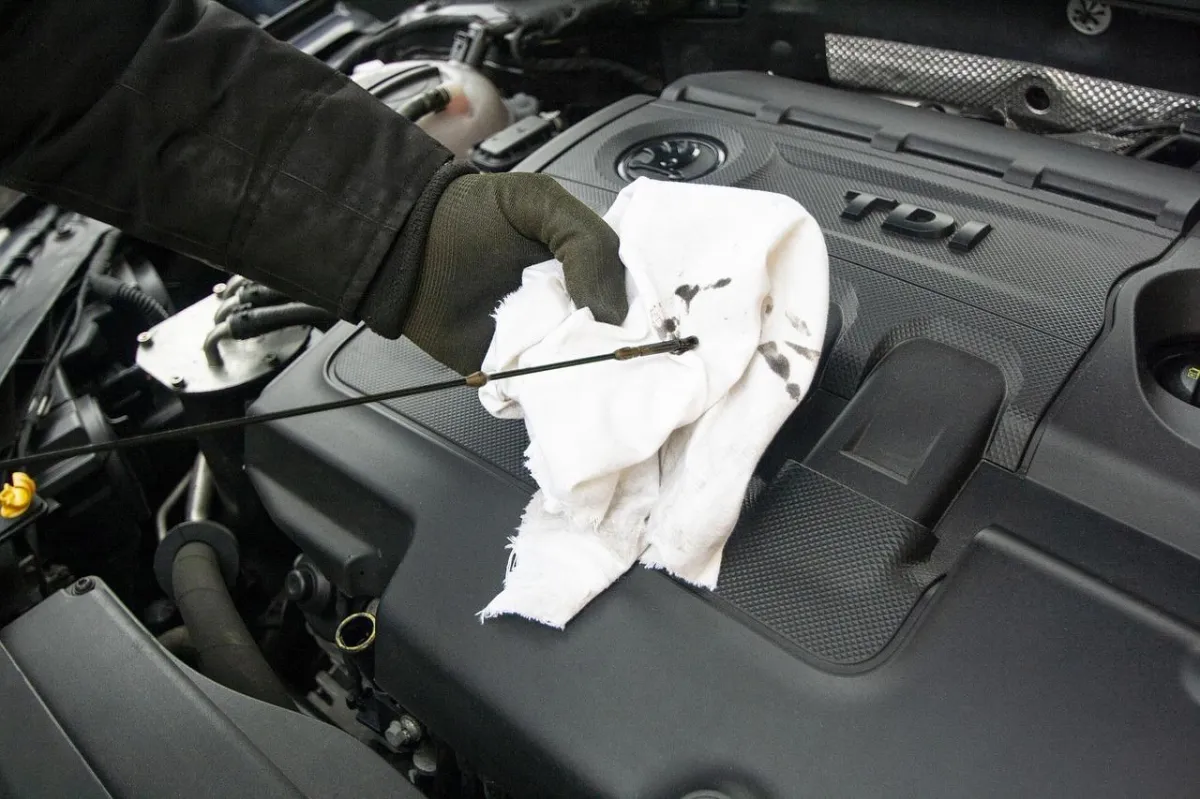Oil change service with fresh motor oil at Overland Tire & Auto in St. Louis.