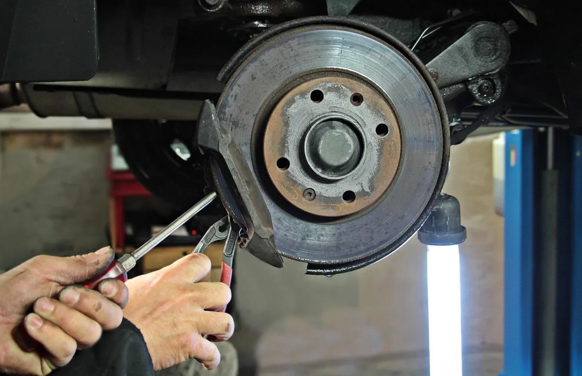 Brake inspection and suspension service by mechanic in St. Louis – Overland Tire & Auto.