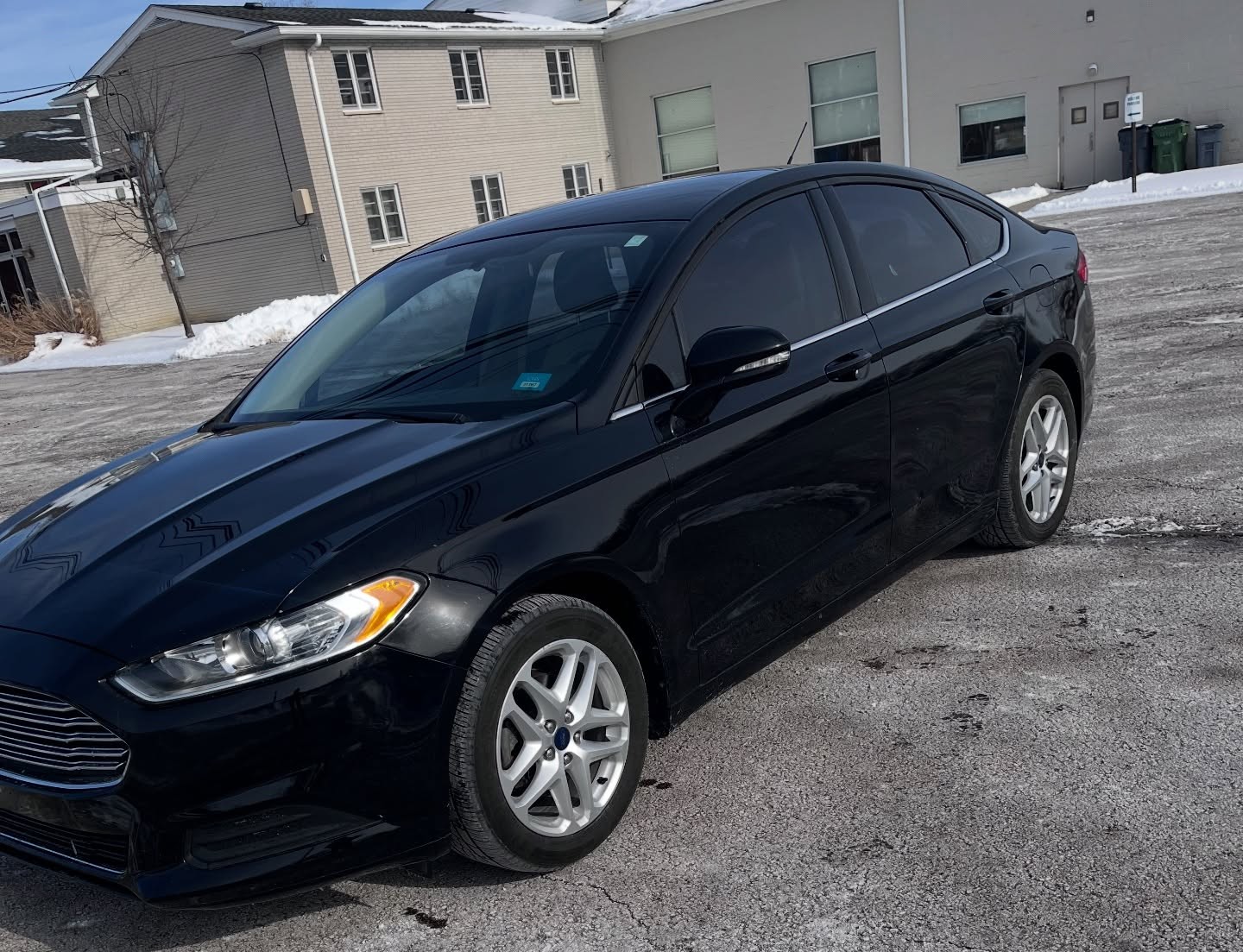 Clean rental car parked in Detroit city