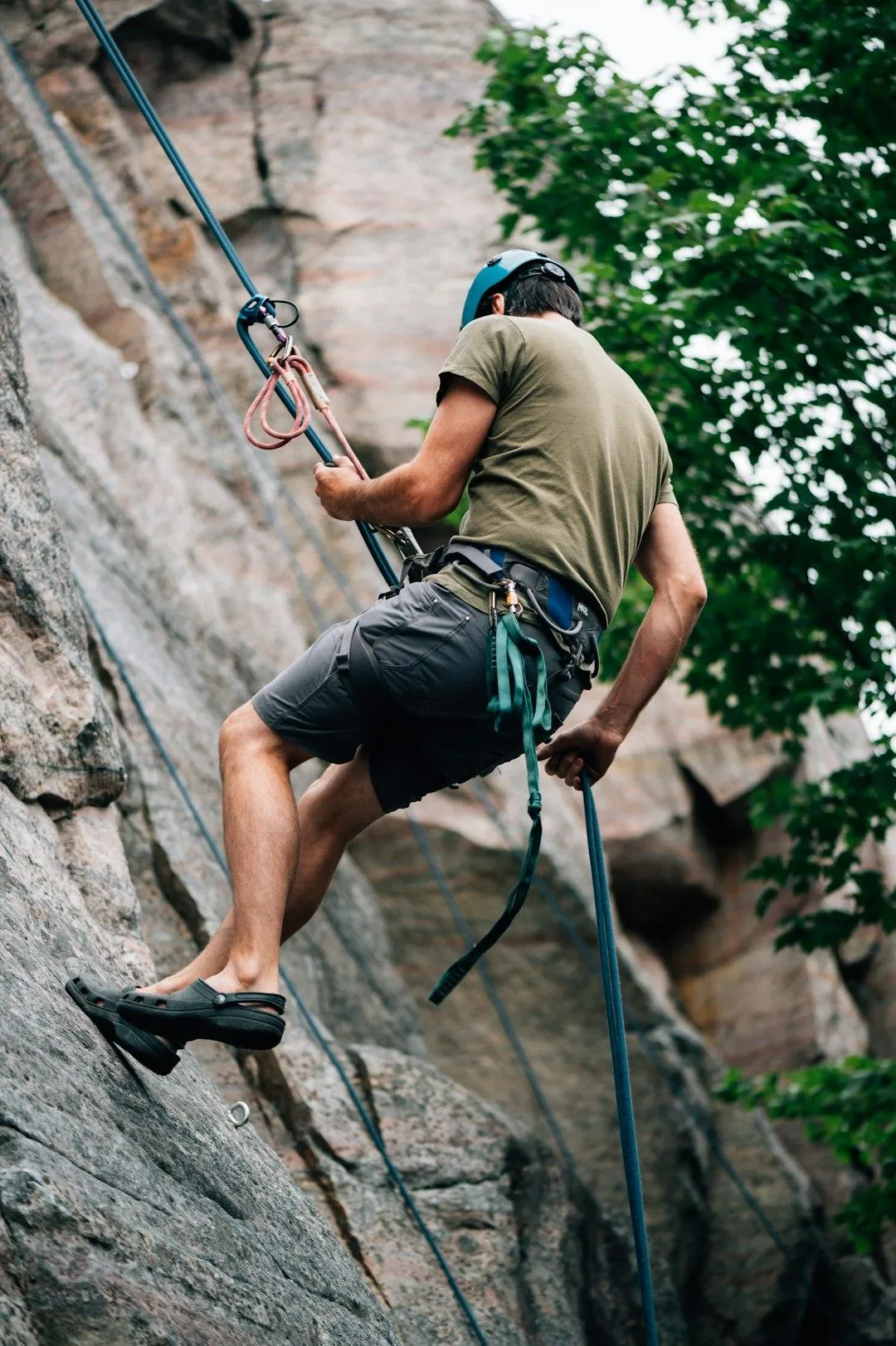 man rock climbing