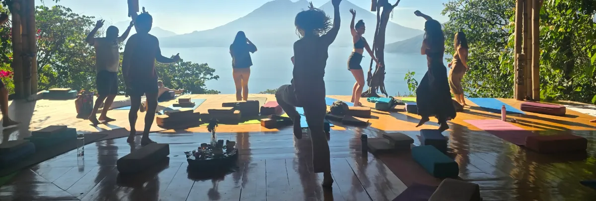 Group movement practice on an open-air terrace at Lake Atitlán, Guatemala, at a Tantra Ritual retreat