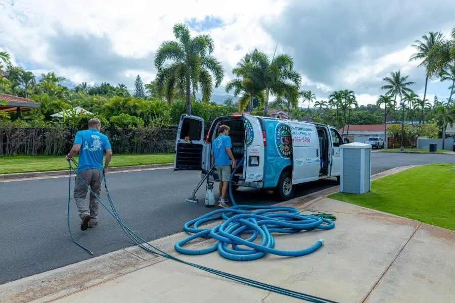 CSI van and hoses staged for a carpet and upholstery clean
