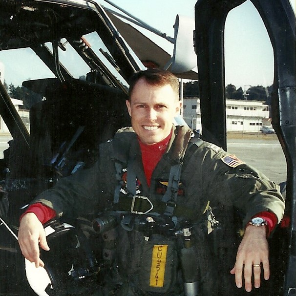 Author portrait of a friendly family safety educator smiling