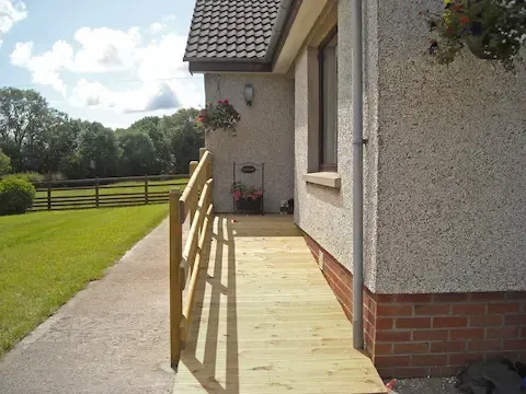 Aging in place remodeling - wheelchair-accessible ramp installation by Bloomington Home Exteriors.