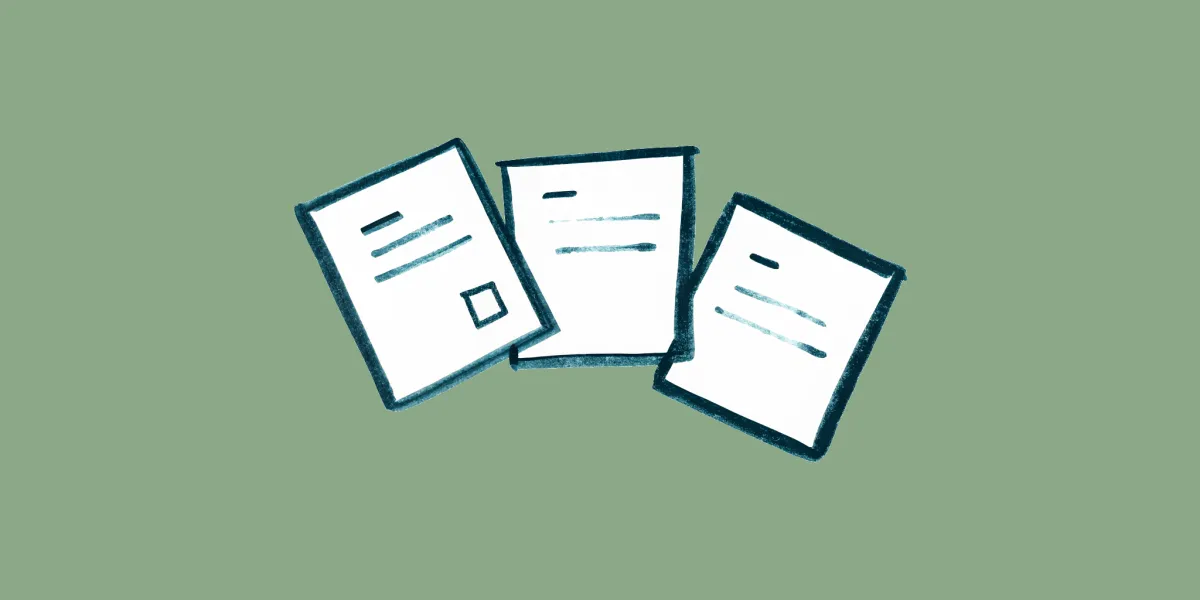 A hand-drawn illustration of three note cards fanned out with short handwritten lines on each, on a soft sage background