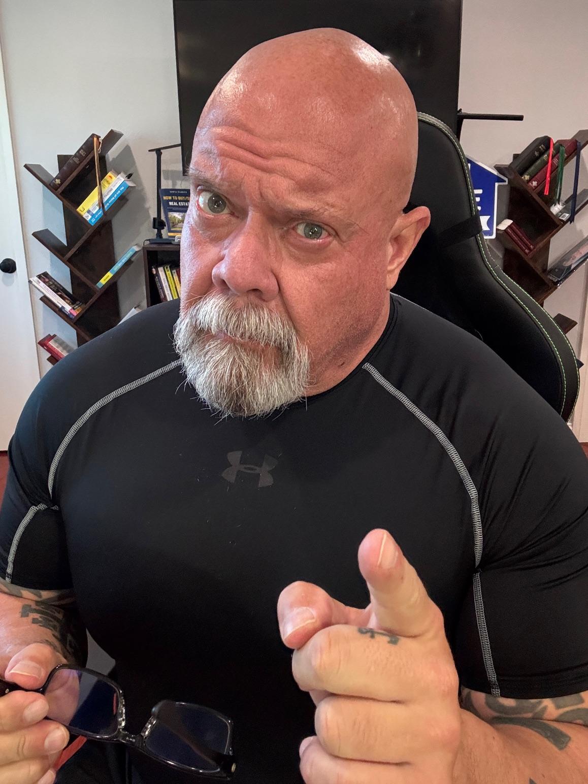 Portrait of Connor, mid-30s, friendly expression, casual-professional attire, half-body portrait with soft studio lighting on neutral background, natural skin tones, high-resolution 1:1 framing suitable for an About page.