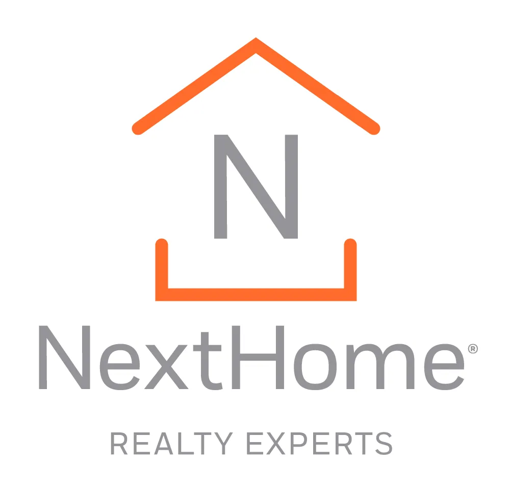 NextHome Realty Experts logo featuring a stylized house outline in orange with the letter 'N' inside. Below the house, 'NextHome' is written in gray, with 'REALTY EXPERTS' in smaller gray text underneath