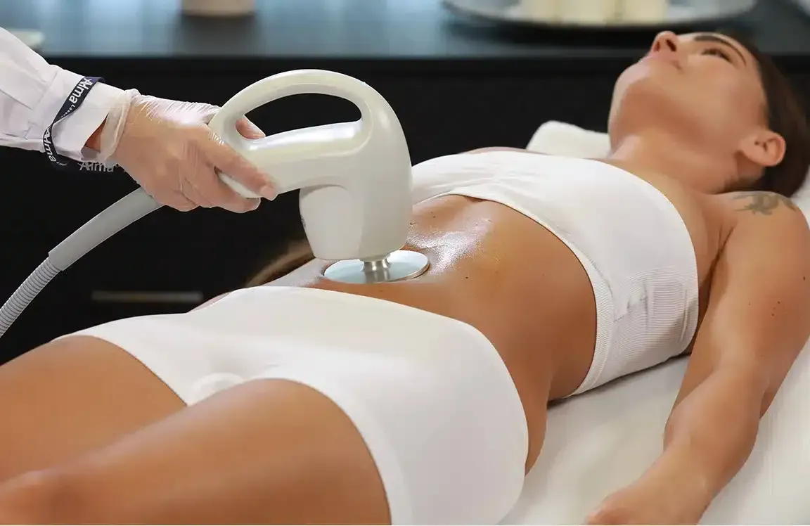 Wooden sauna interior with bucket and ladle.