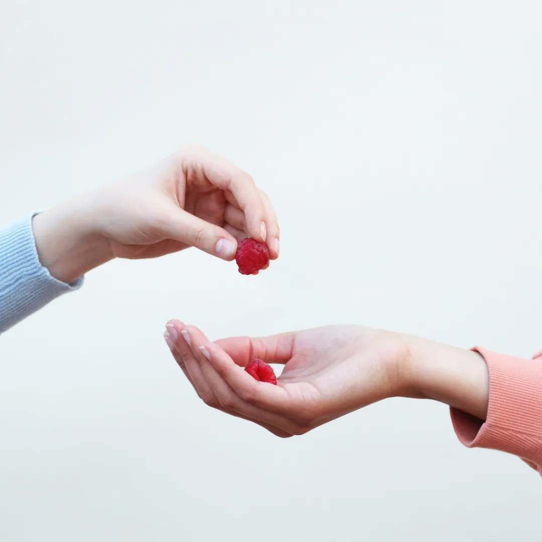 woman and man sitting in front of monitor