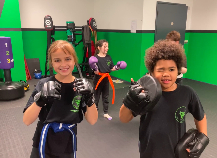 Children aged 8–13 training in junior martial arts and self‑defence
