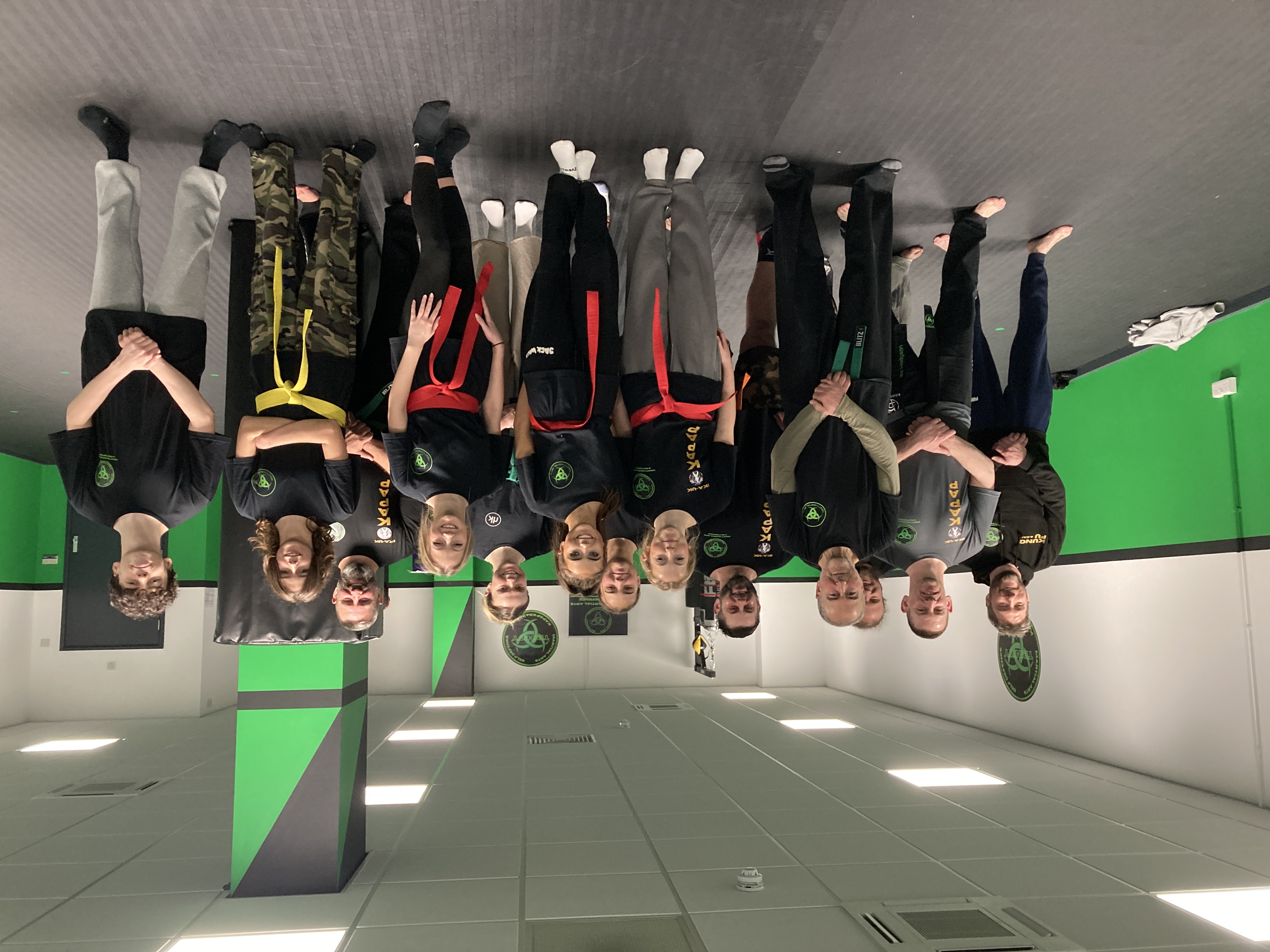 Teens and adults practising practical self‑defence and martial arts training