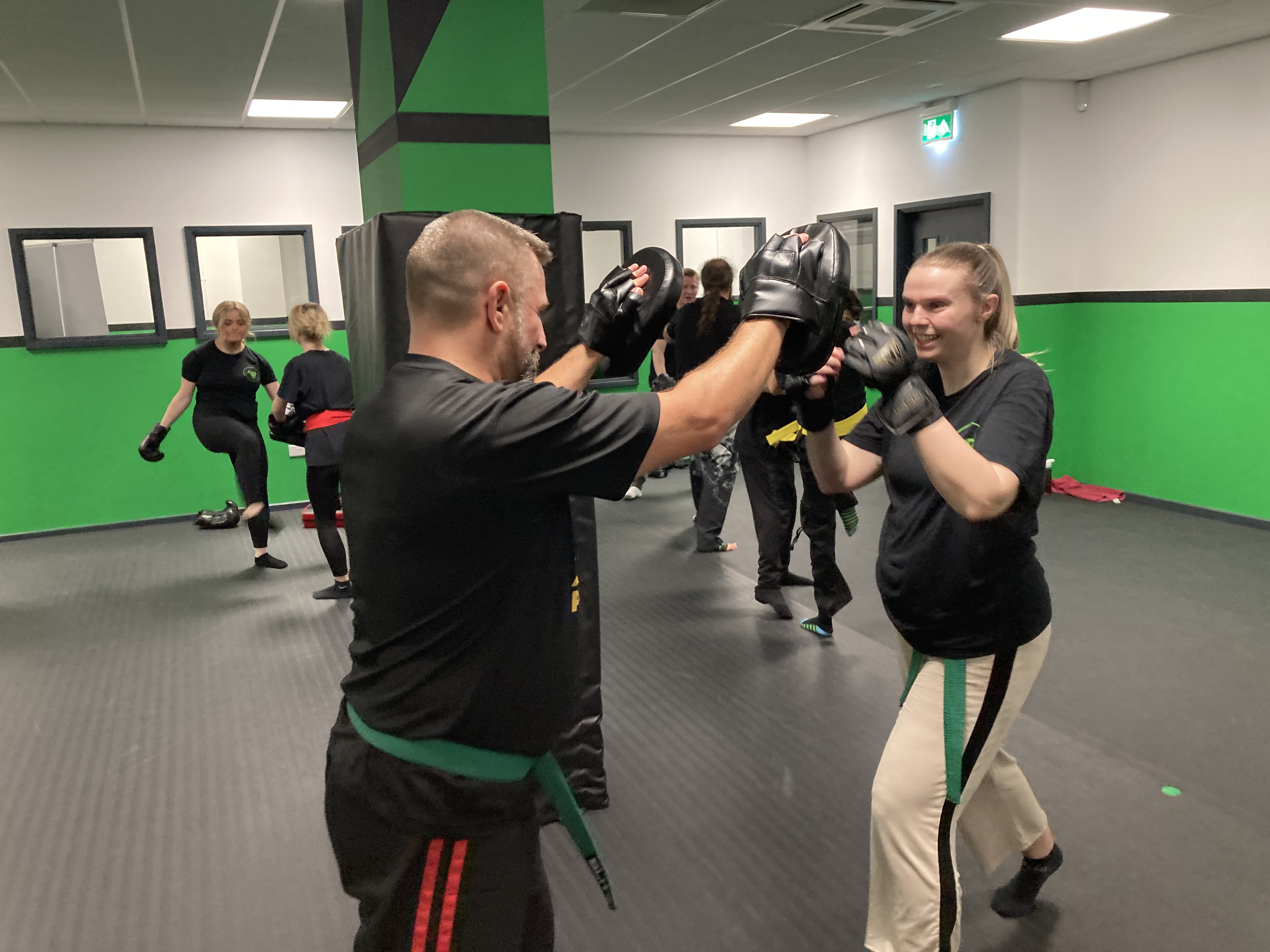 Adult self-defence drill focusing on awareness, control and practical technique