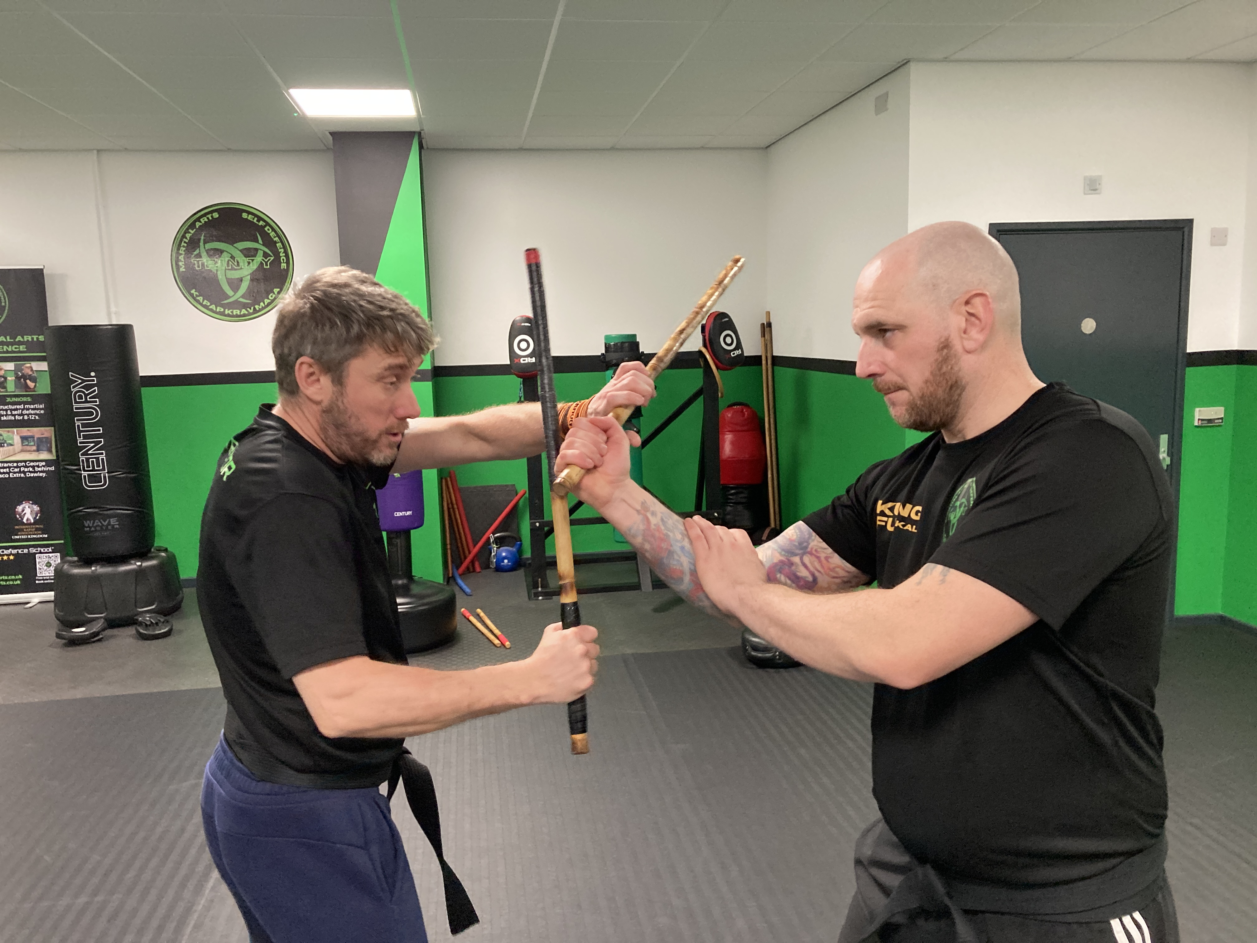 Adult self-defence drill focusing on awareness, control and practical technique