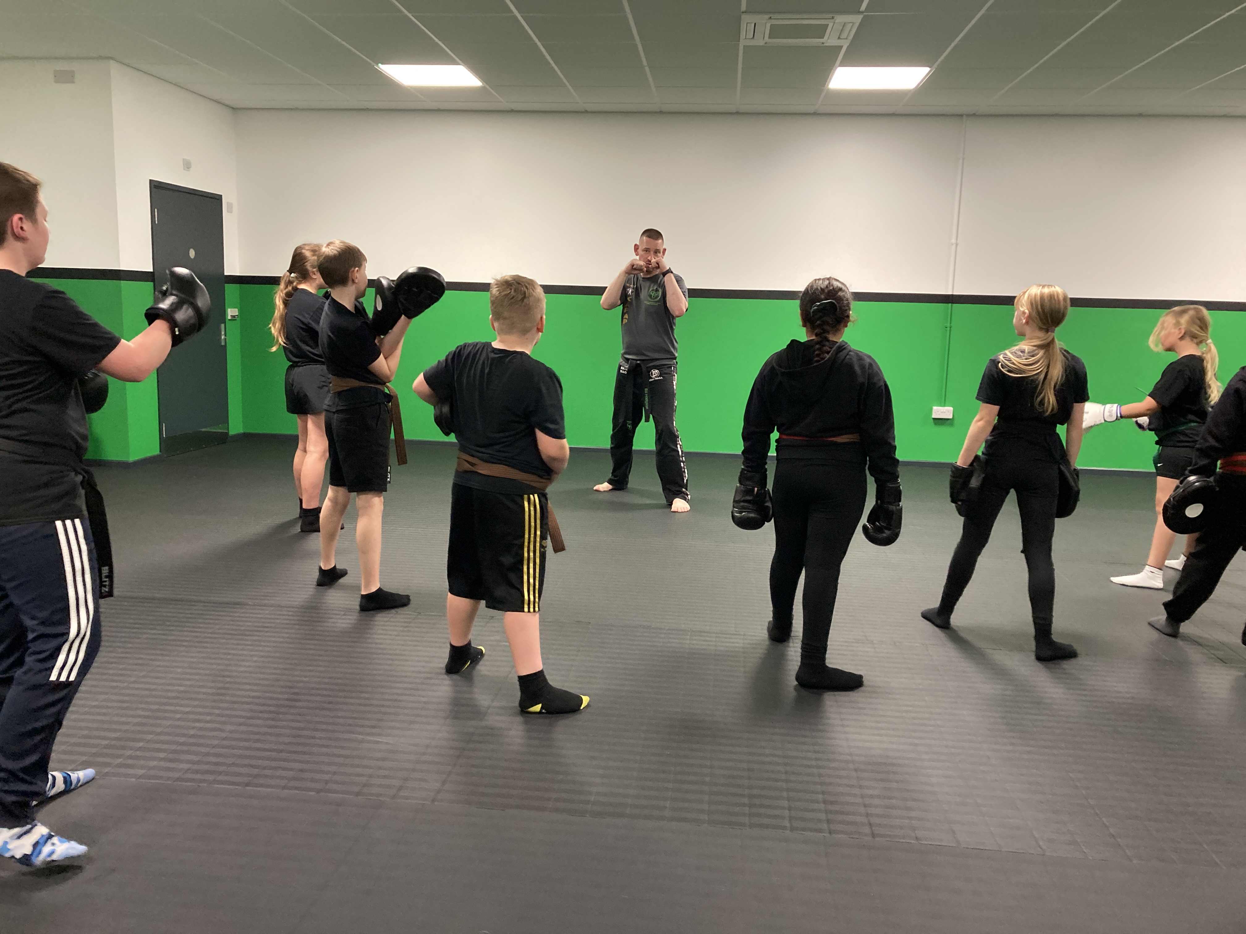 Students practising self-defence stances and movements.