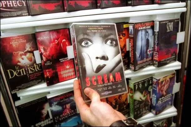 Roller coaster track against a blue sky