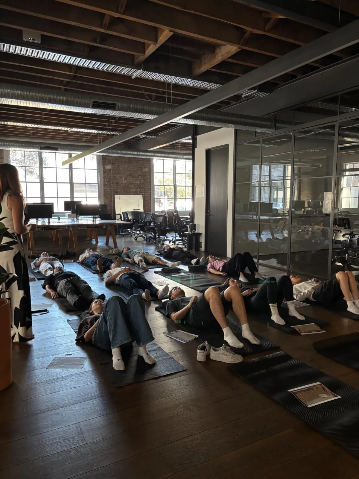 Team engaging in breathwork reset