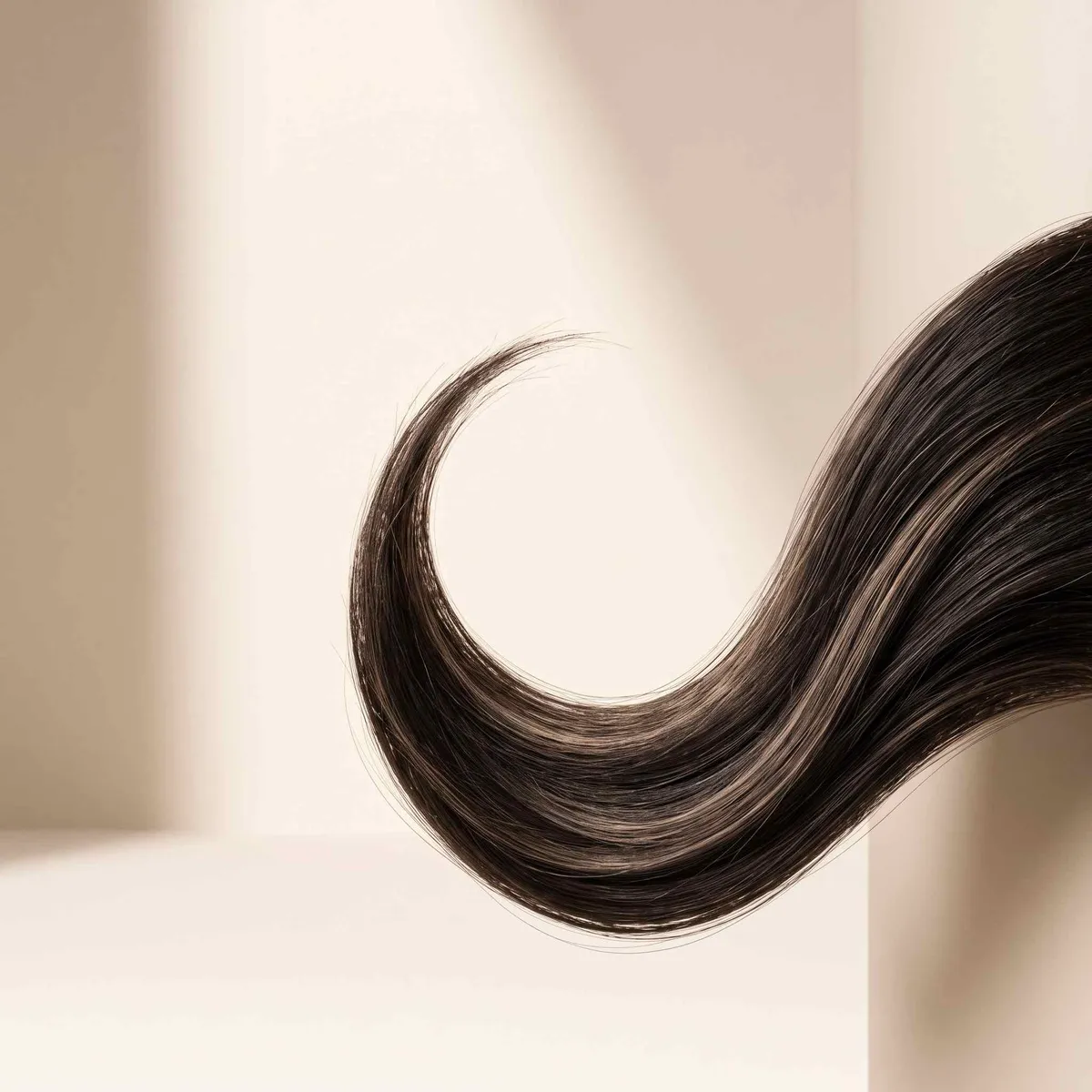 TT LAB beauty-led hair-care imagery with elegant hair movement silhouette