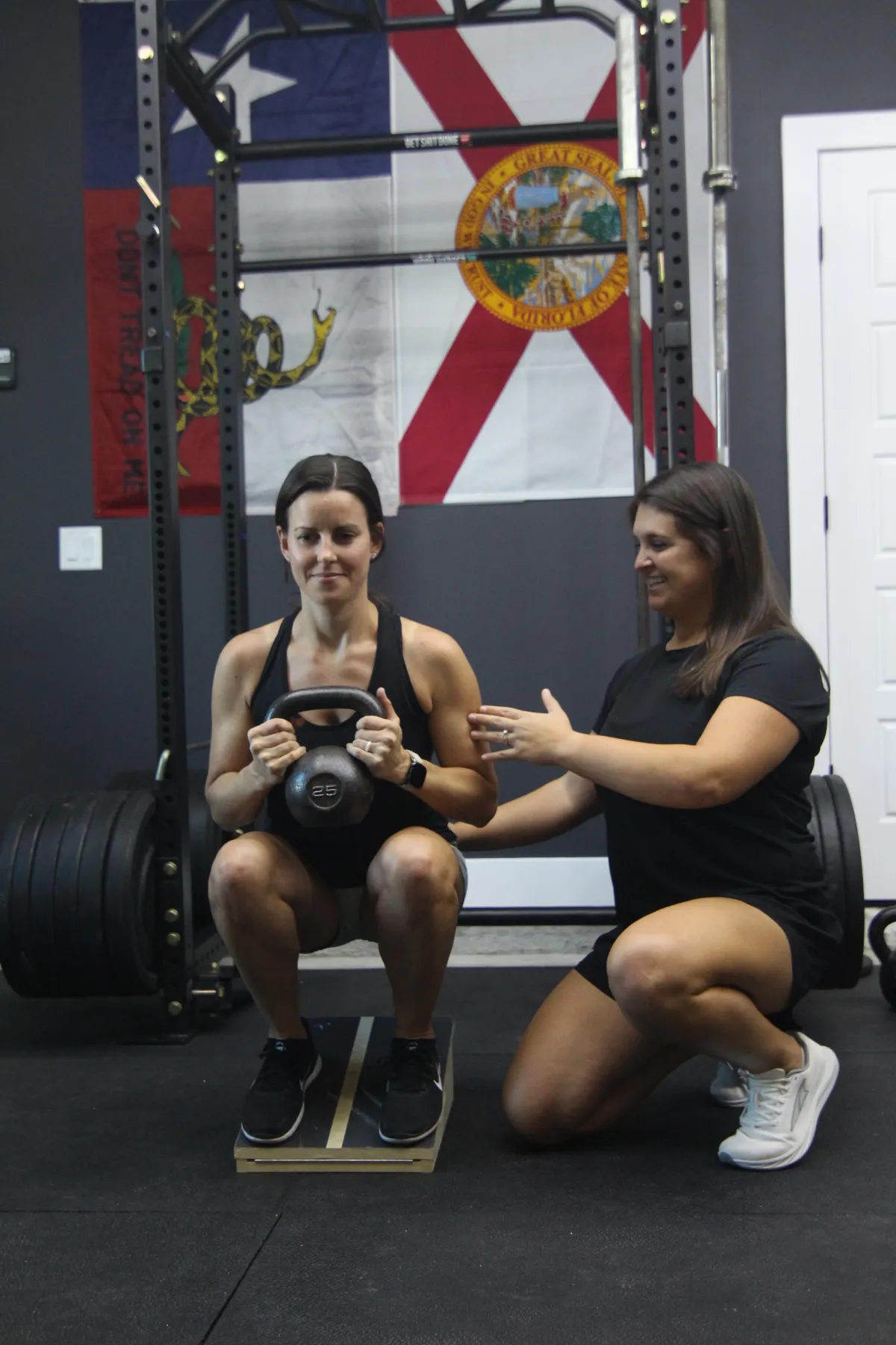 person holding white bowl with sliced lime and ginger inside