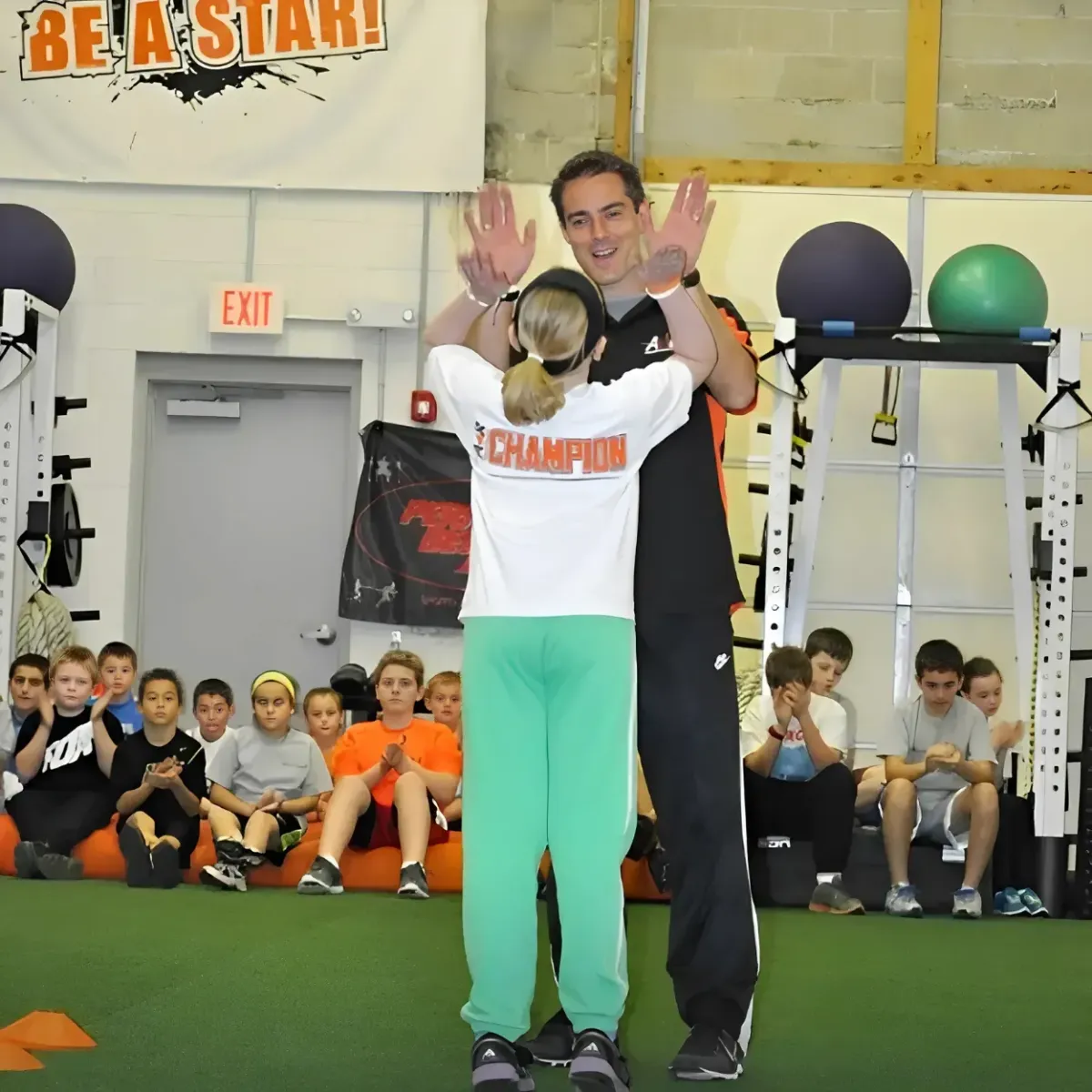 Image of Coach Dave Gleason giving back to the community.