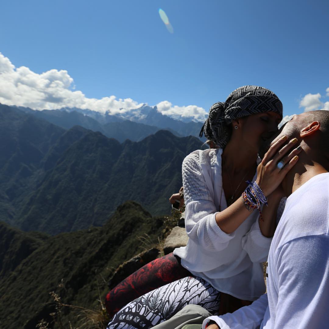 tah and kole whitty, married couple on mountain peak