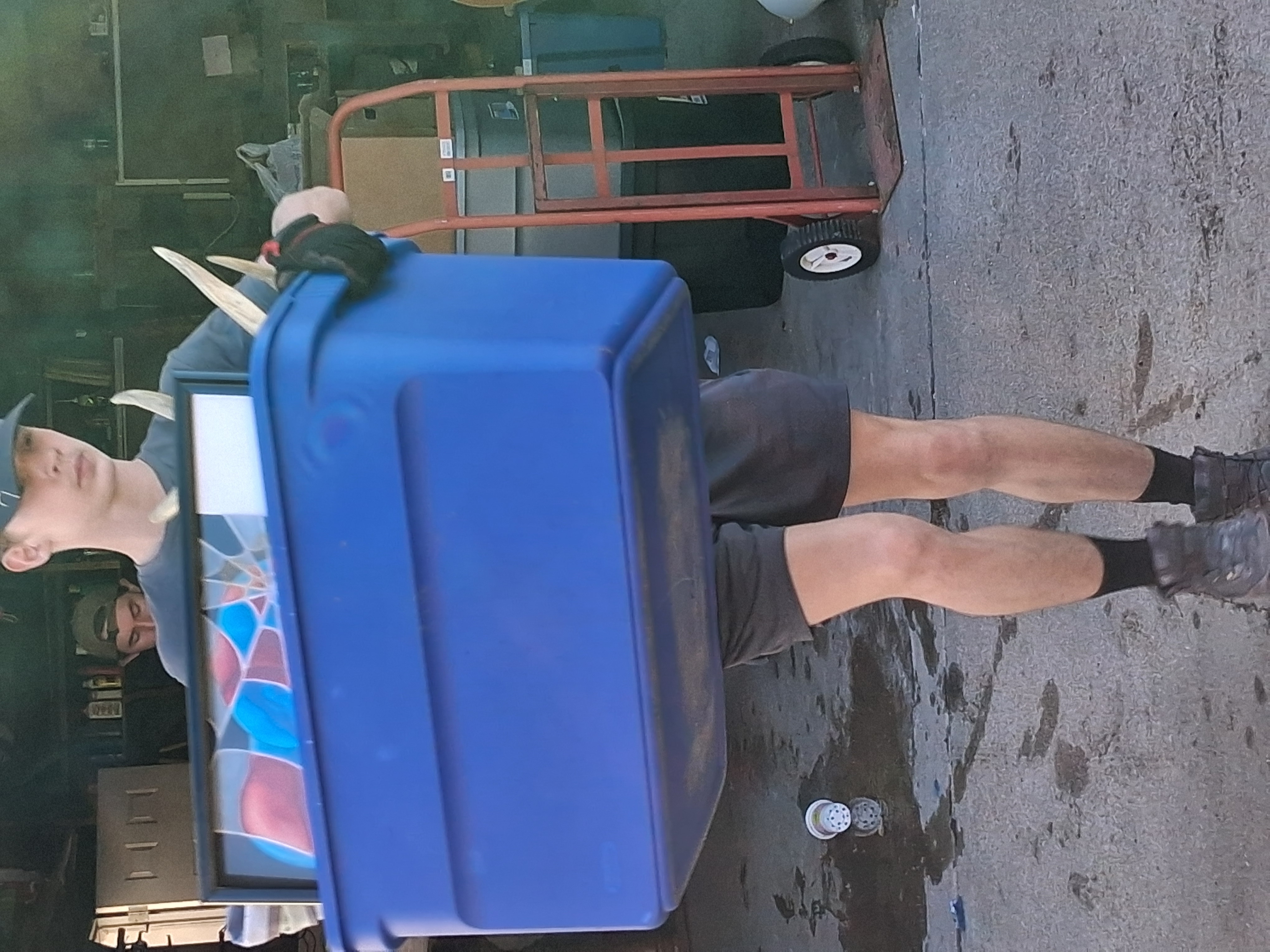 a Chet's Transfer of Kearney, Inc.'s crew member carefully prepairing items for moving