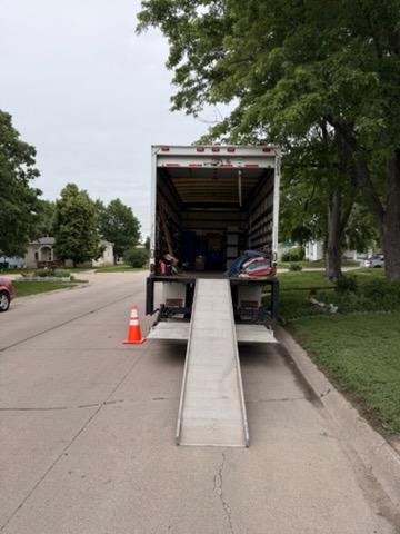 Chet's Transfer of Kearney, Inc. crew membes safely moving packed items