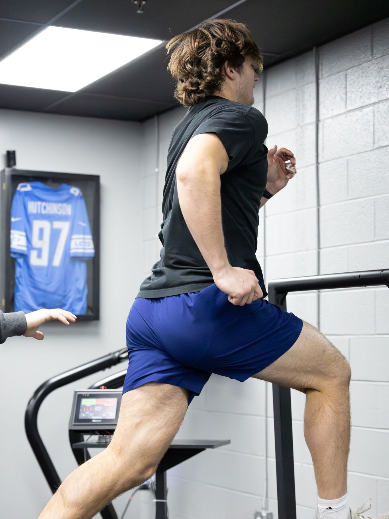 Athlete completing high-speed treadmill sprint training at Impact Sports Performance