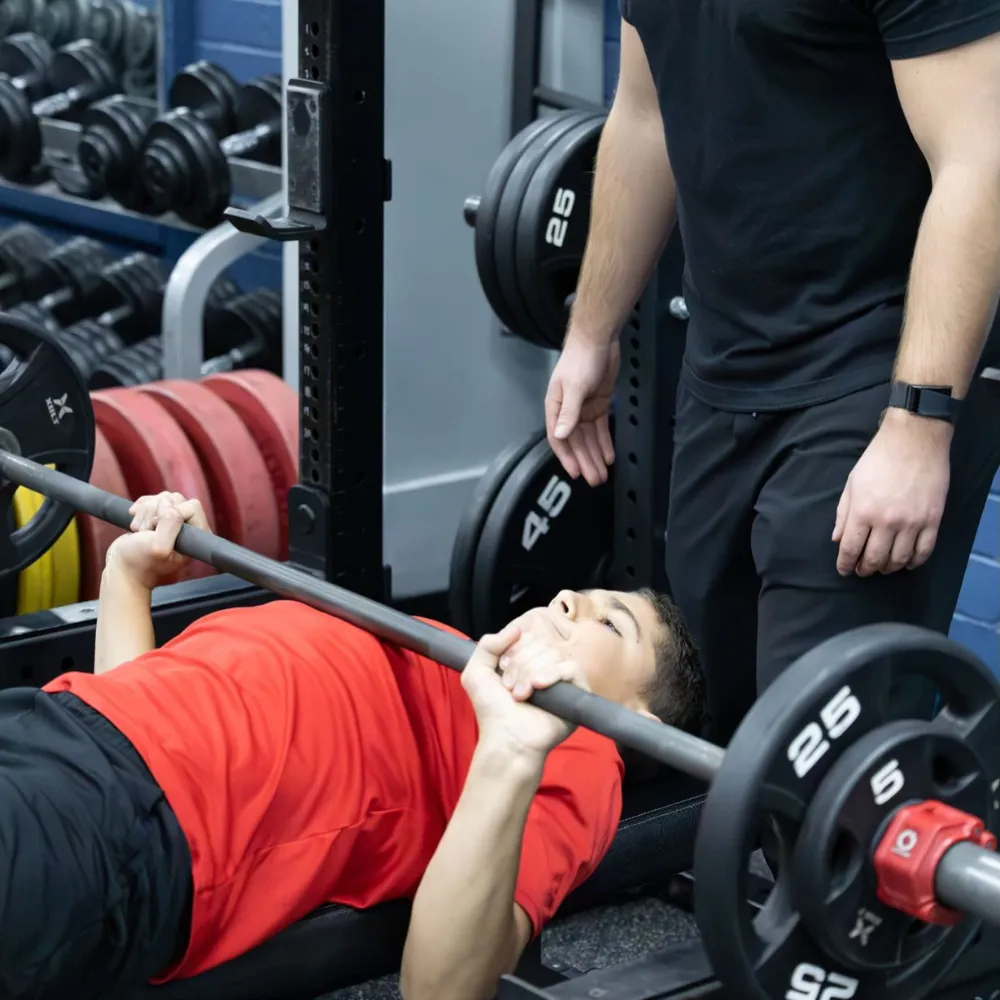 Middle school athletes completing strength and conditioning training at Impact Sports Performance