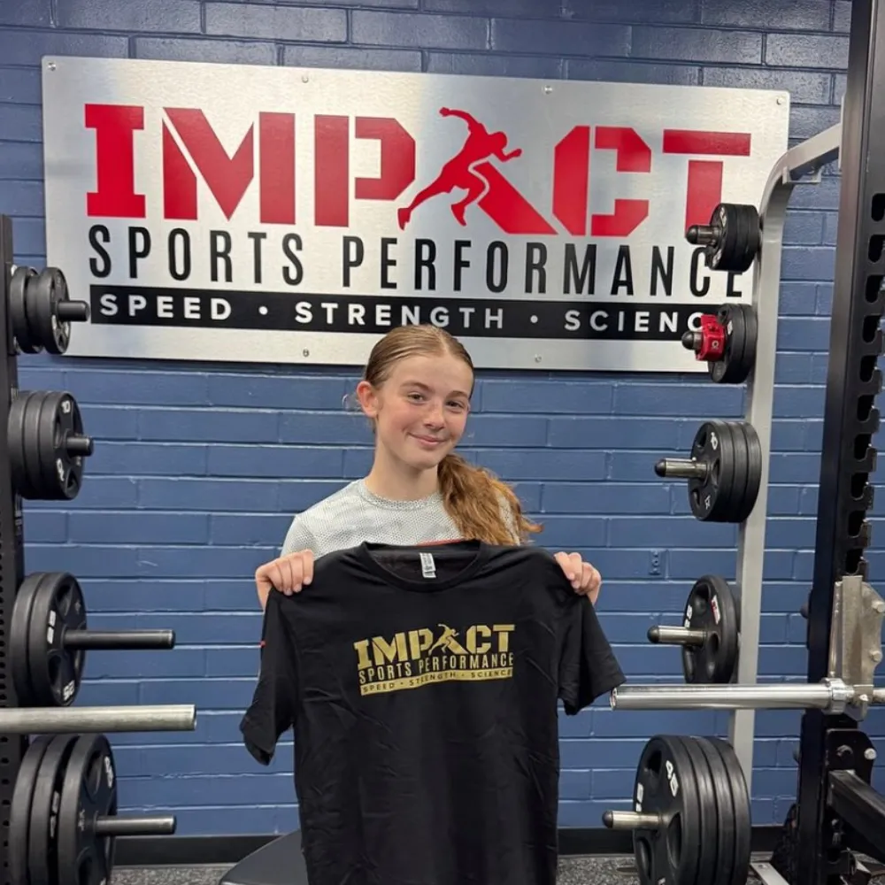 Middle school athlete working on sprint technique during sports performance training at Impact Sports Performance