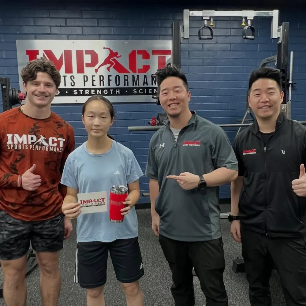 Middle school athletes training together in structured sports performance session at Impact Sports Performance