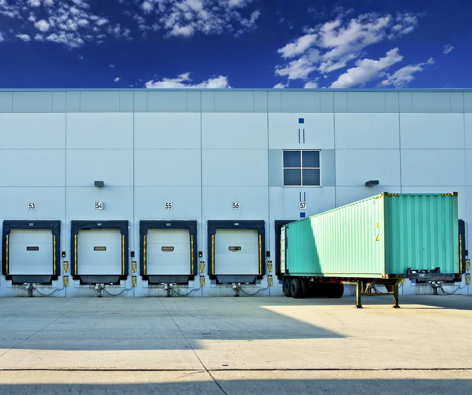 Multimodal logistics map showing trucks, freight train, container ship, and cargo aircraft connected by route lines.