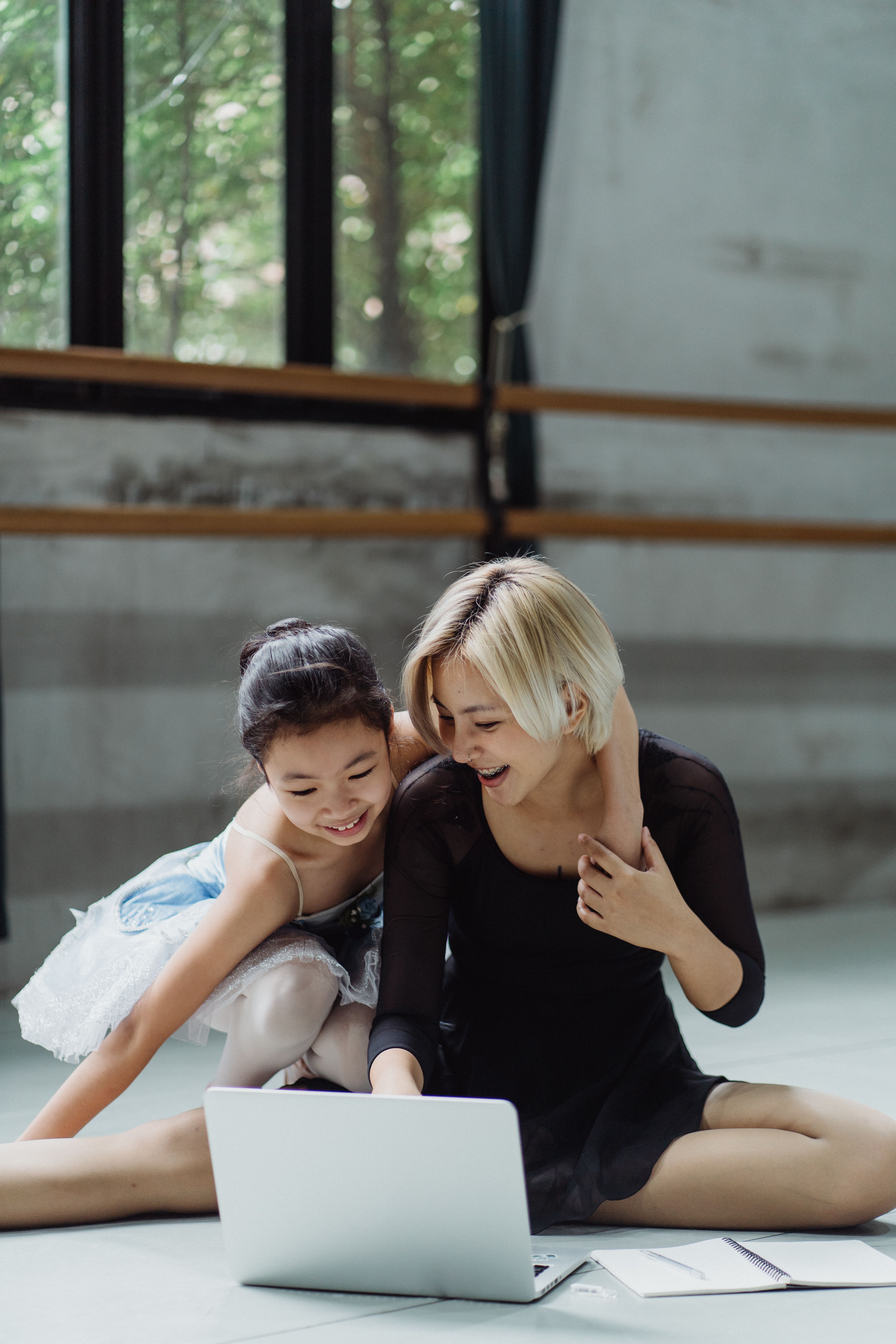 Teacher using a tablet during a class rehearsal, demonstrating anywhere accessibility
