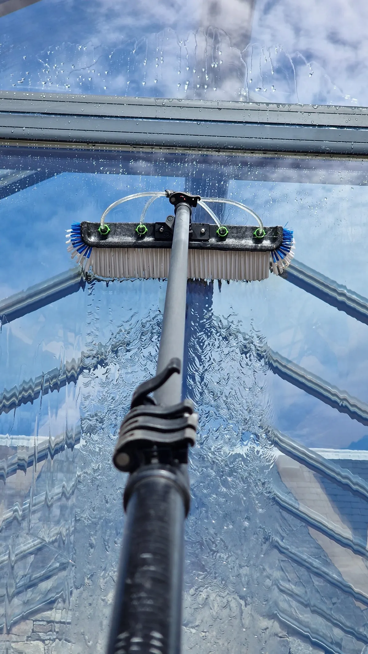 High level water fed pole window cleaning