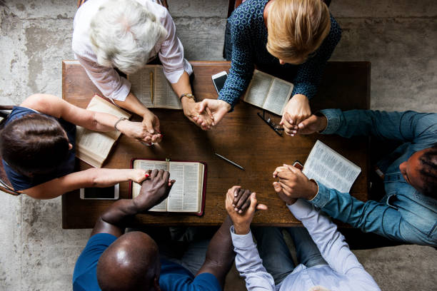group of people praying
