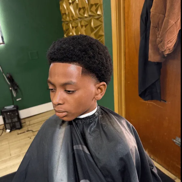 Styling textured and afro hair for a child