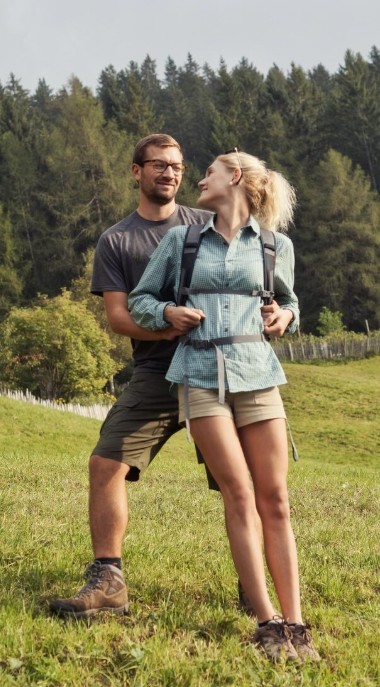 happy couple enjoying a hike with a strong immune system after boosting treatments from alternative medicine practitioner in woodbury mn.