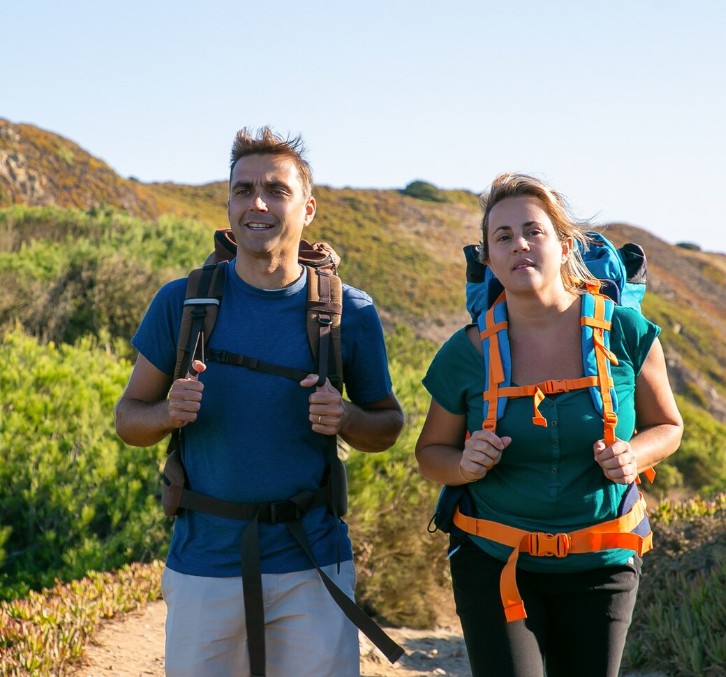 couple hiking outdoors, living without limits after care from a herbal medicine practitioner in woodbury mn.