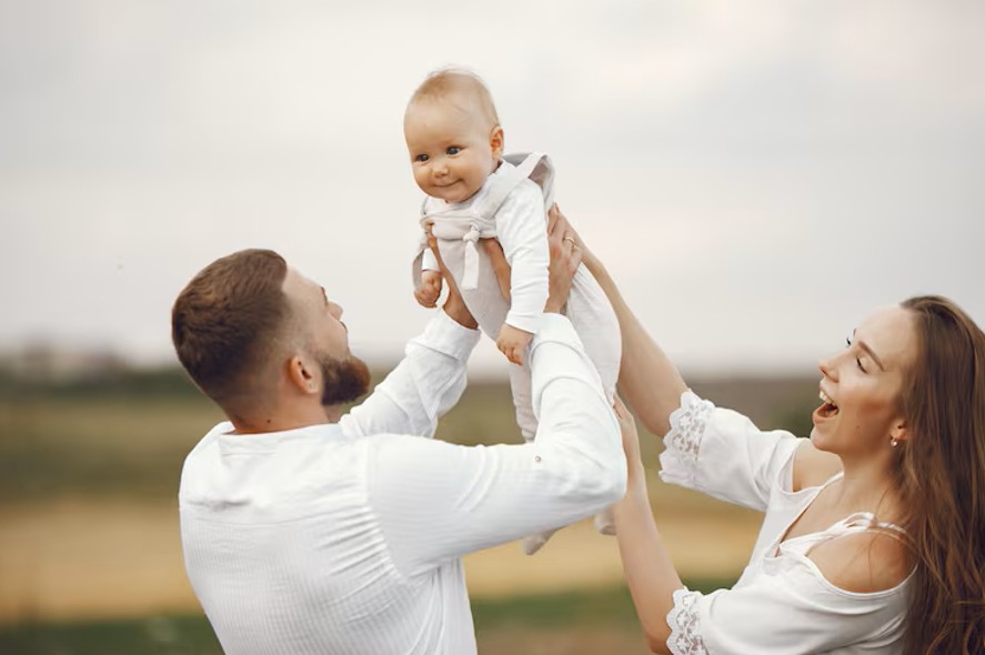 parents with baby enjoying family life after successful fertility acupuncture treatment in woodbury mn.
