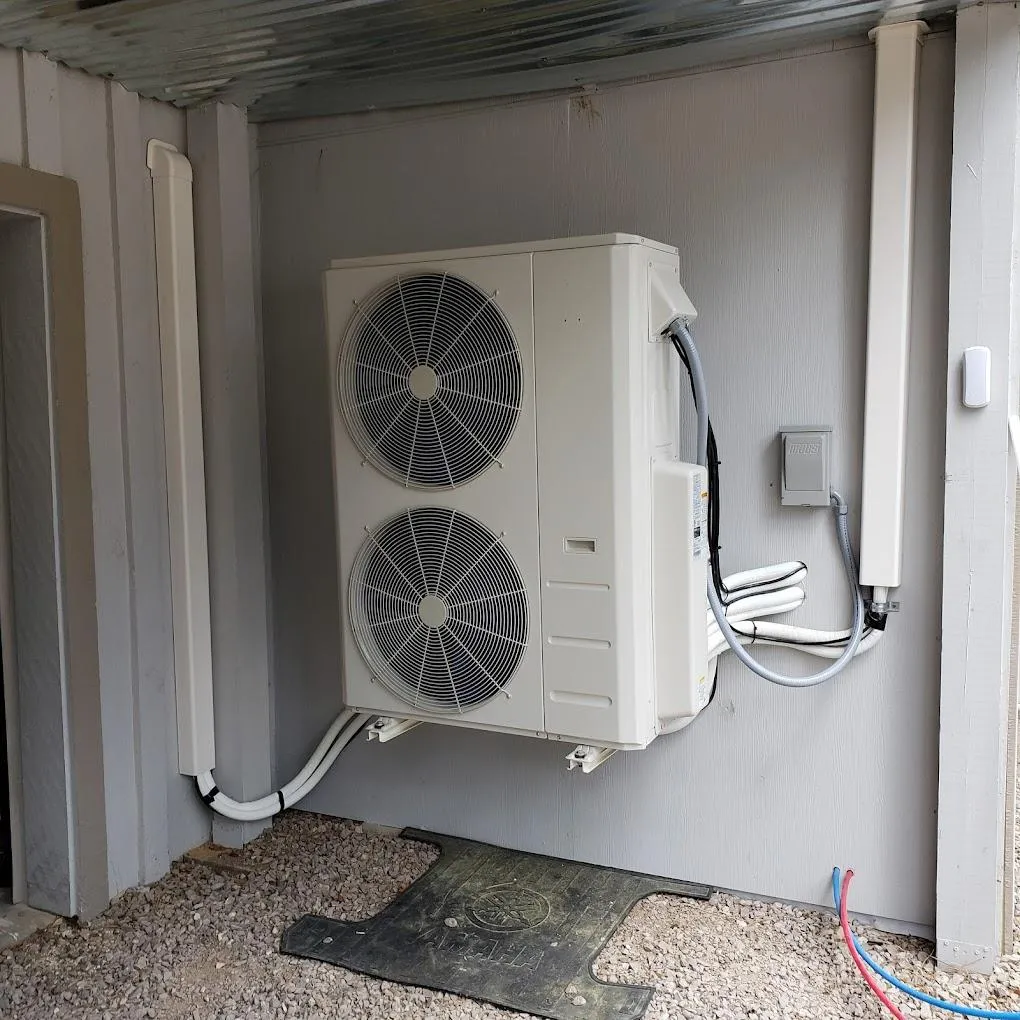 An HVAC system outside of a client's house.