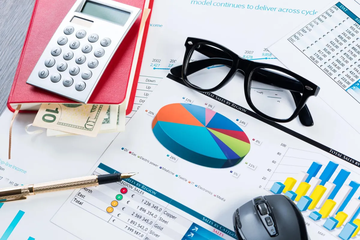 business report still life, black glasses