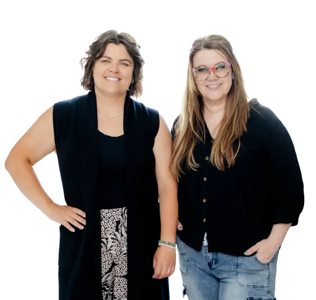 Kim and Kat smiling with raised hands in a casual pose on a transparent background.