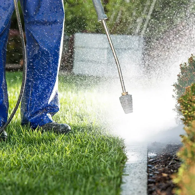 an expert pressure washer on the job