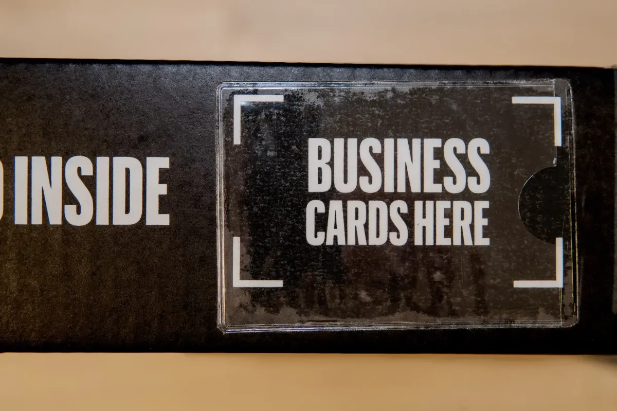 business card sleeve on shingle tomb