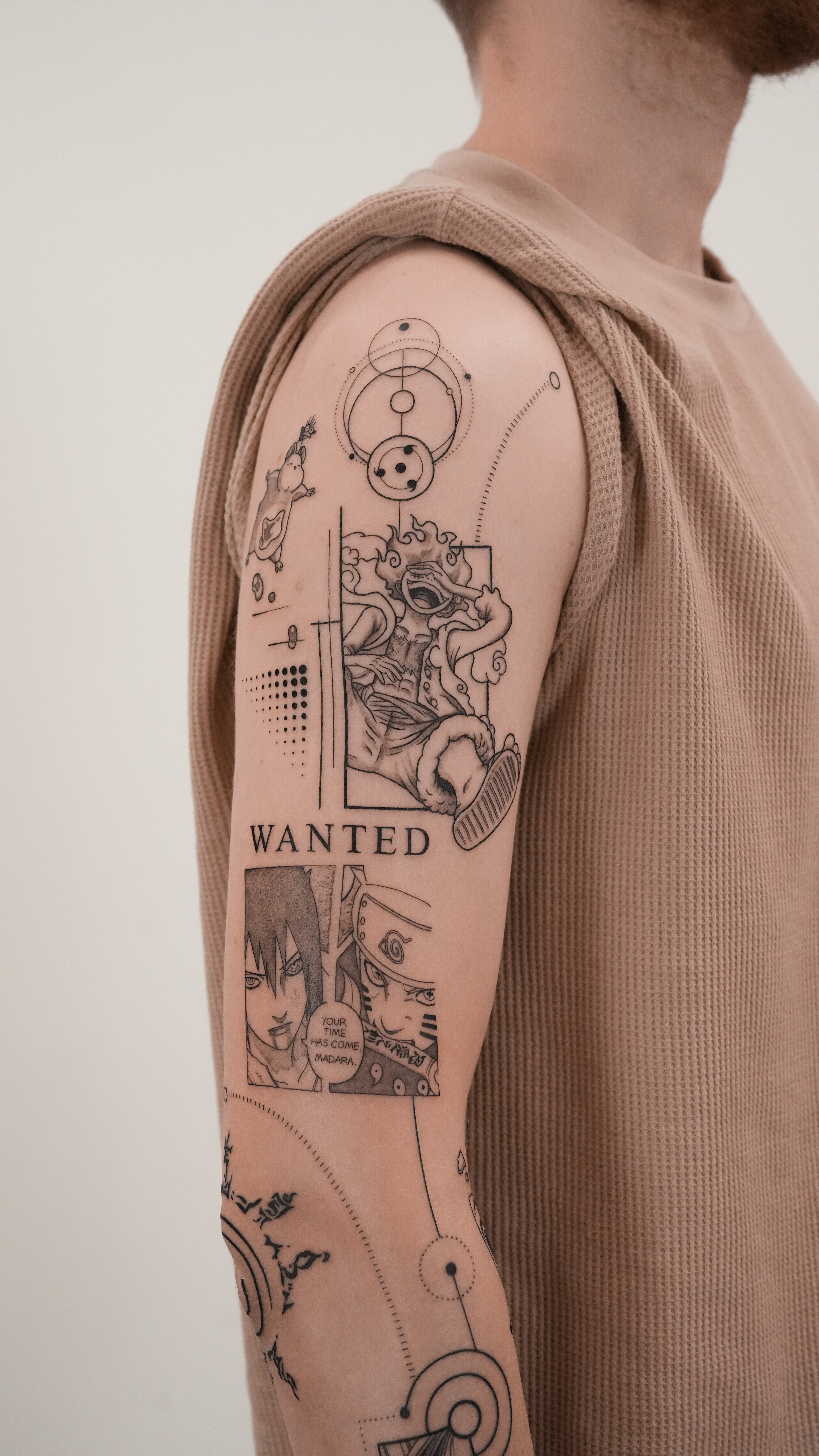 person with tattoo on right arm