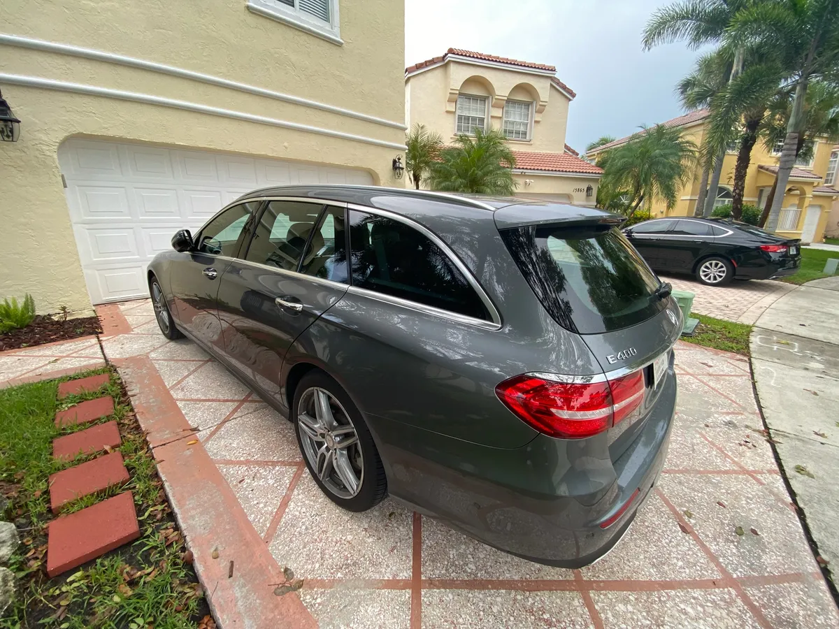 Freshly tinted Mercedes-Benz wagon in a Miramar driveway