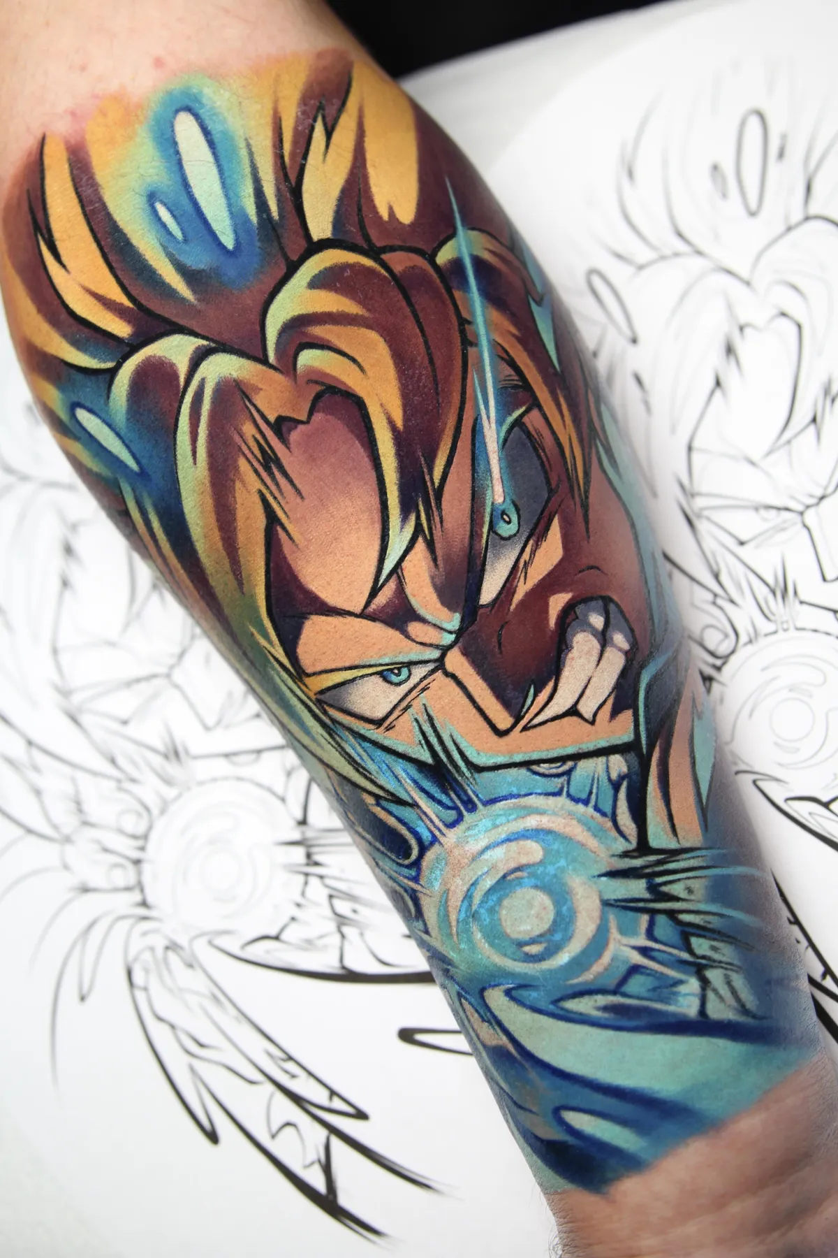 Super Saiyan Goku tattoo from DBZ by Orlando Anime Tattoo Artist Ren Behan at xsadfamx.