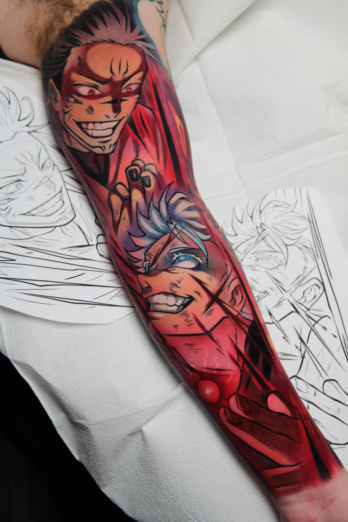 Gojo versus Sukuna tattoo from JJK by Orlando Anime Tattoo Artist Ren Behan at xsadfamx.