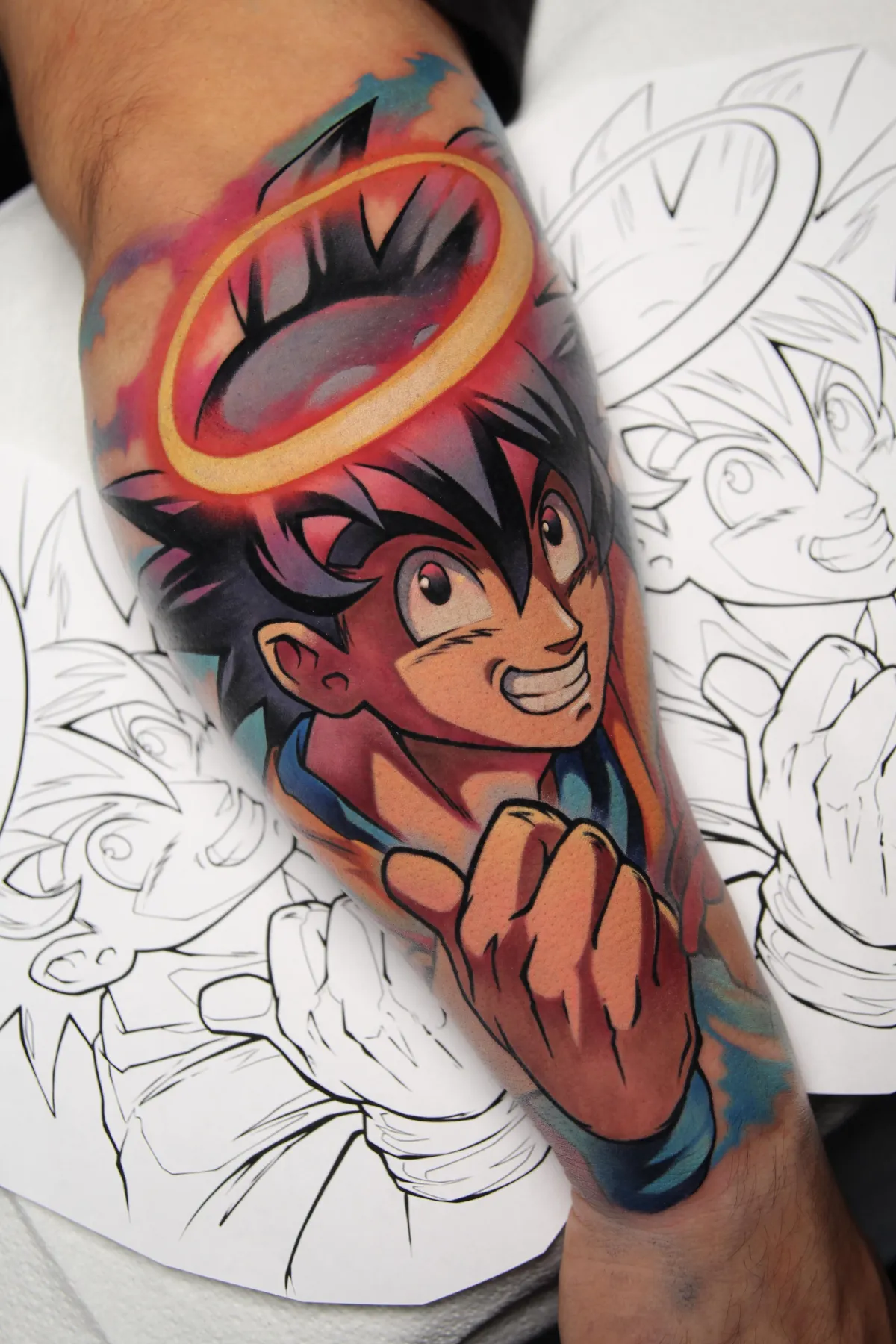 Angel Goku tattoo from DBZ by Orlando Anime Tattoo Artist Ren Behan at xsadfamx.