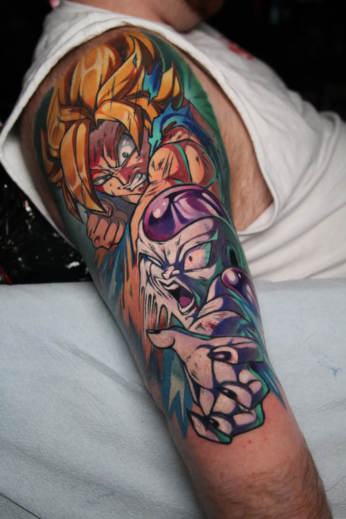 Goku versus Frieza tattoo from DBZ by Orlando Anime Tattoo Artist Ren Behan at xsadfamx.